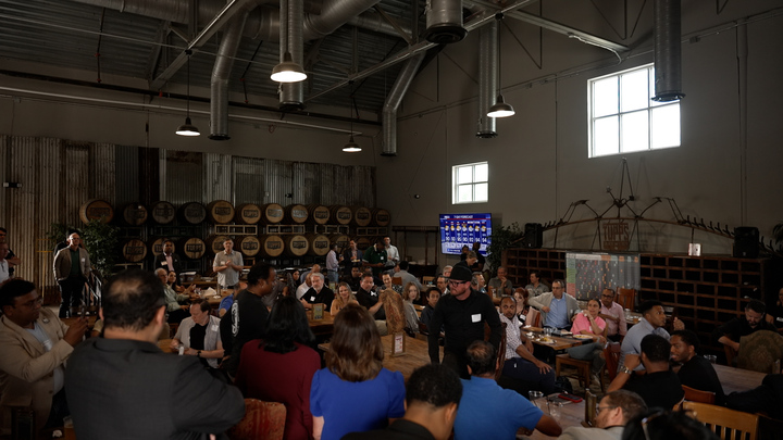 Wide view of the room during builder intros